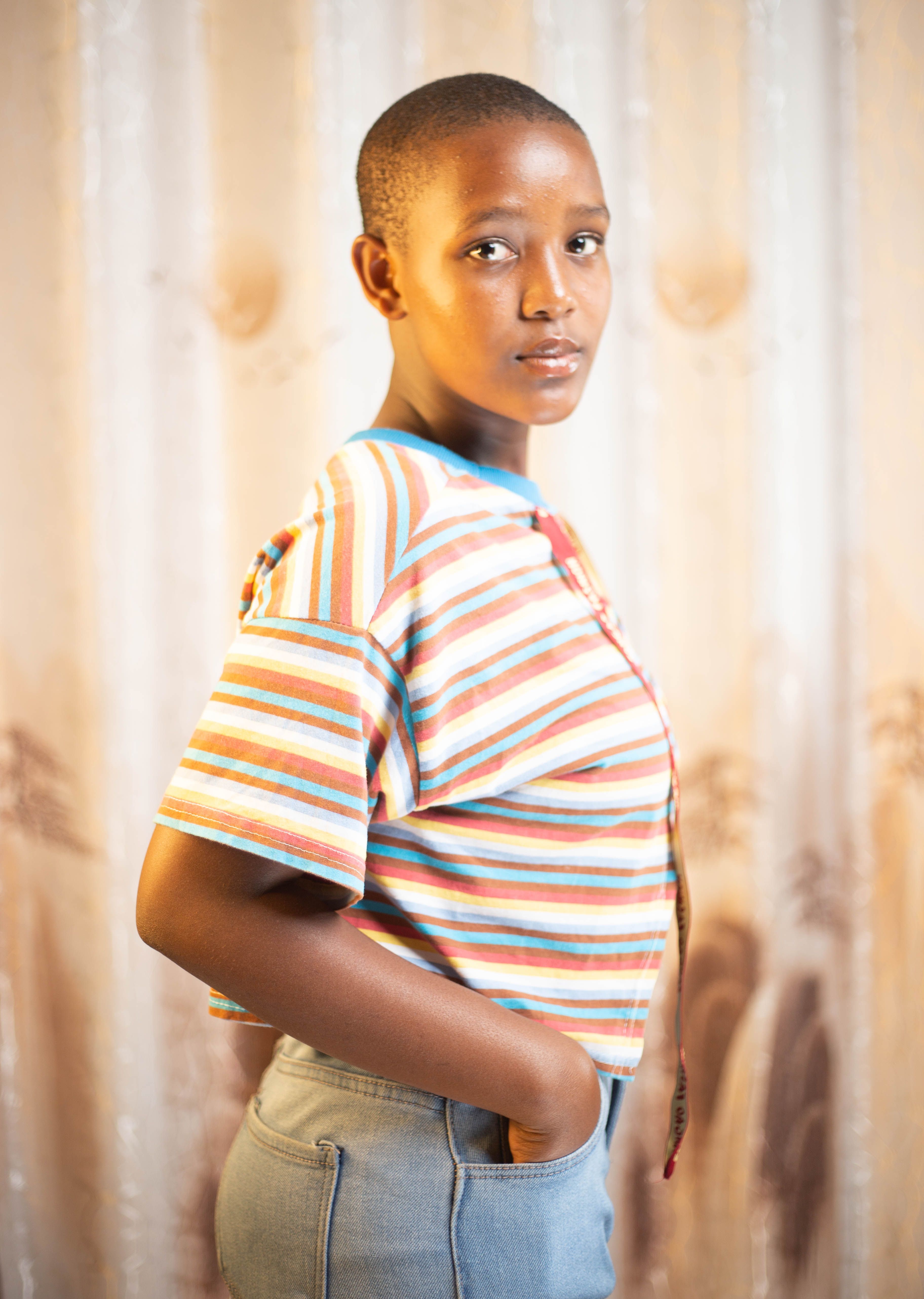 Portrait of a Young Woman in Striped Shirt · Free Stock Photo