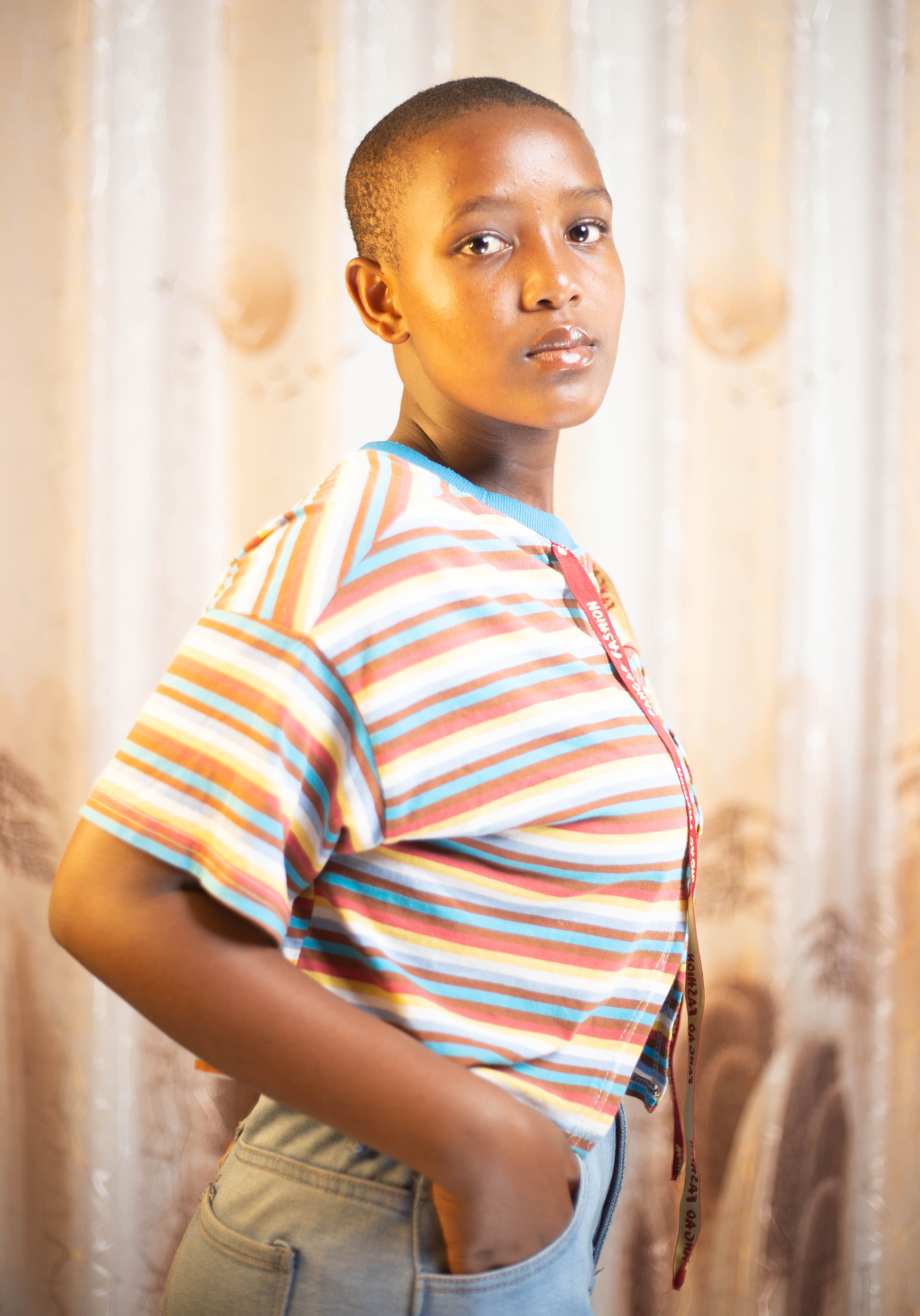 Portrait of a Young Woman in Striped Shirt · Free Stock Photo