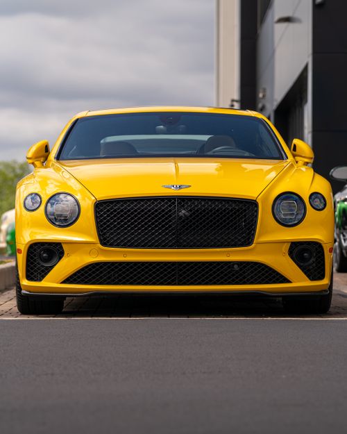 Free A sleek yellow luxury sports car parked outdoors in Virginia. Stock Photo