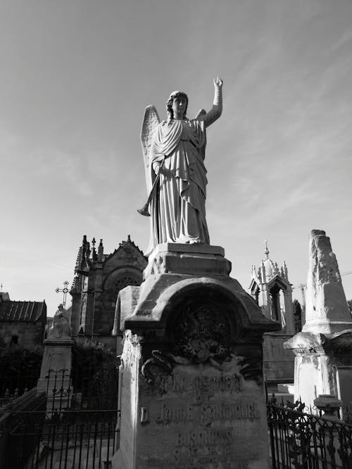 Grayscale Photo Of A Statue 