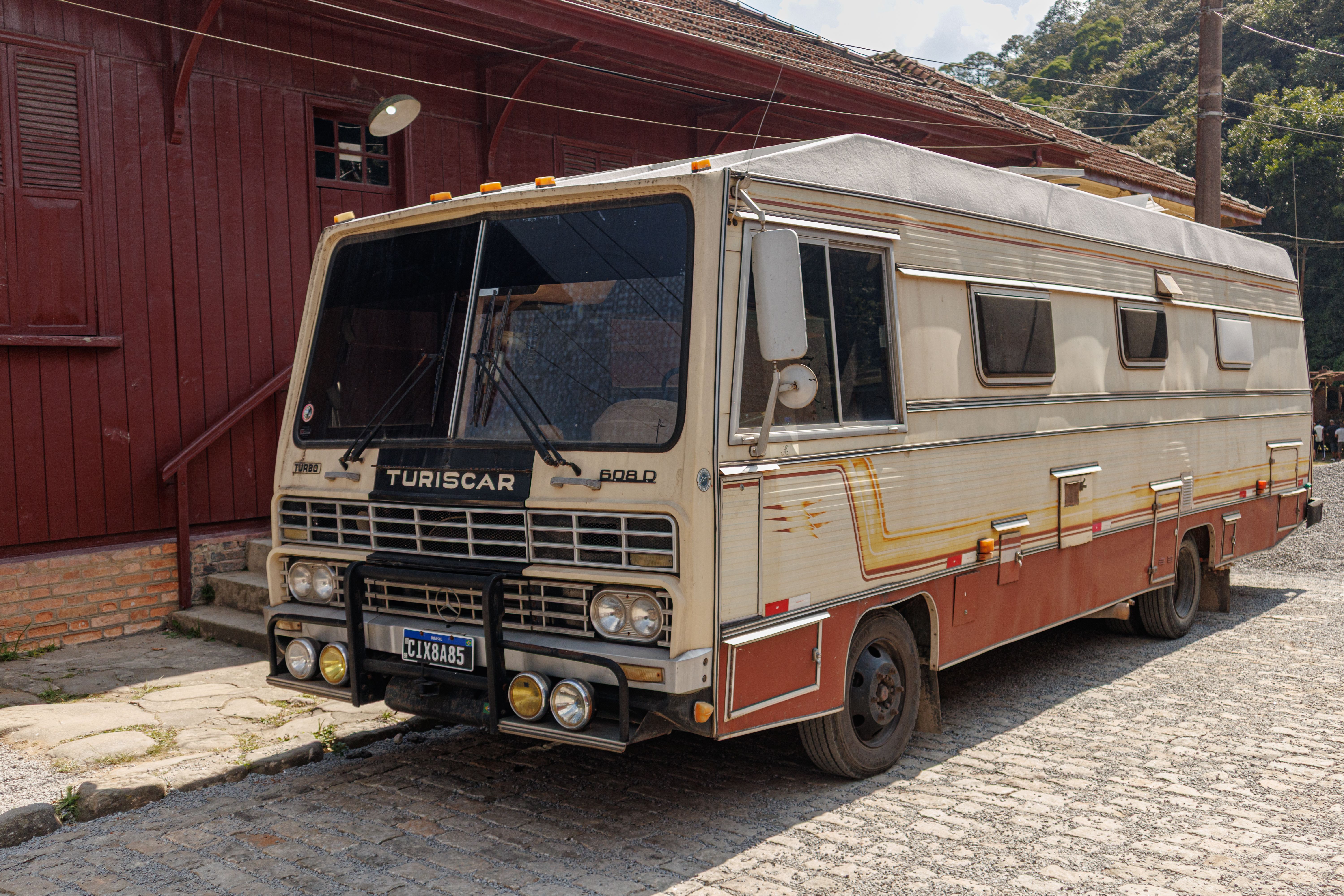 Classic Turiscar motorhome parked on cobblestone street in São Paulo, Brazil.