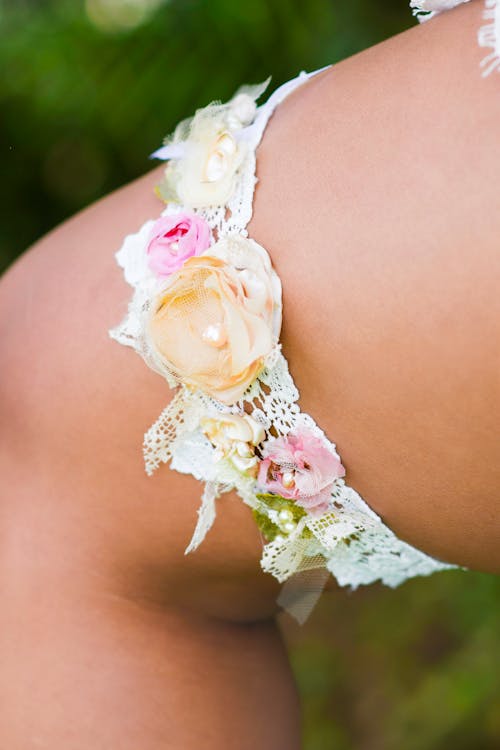 White Garter Decorated with Flowers on Leg