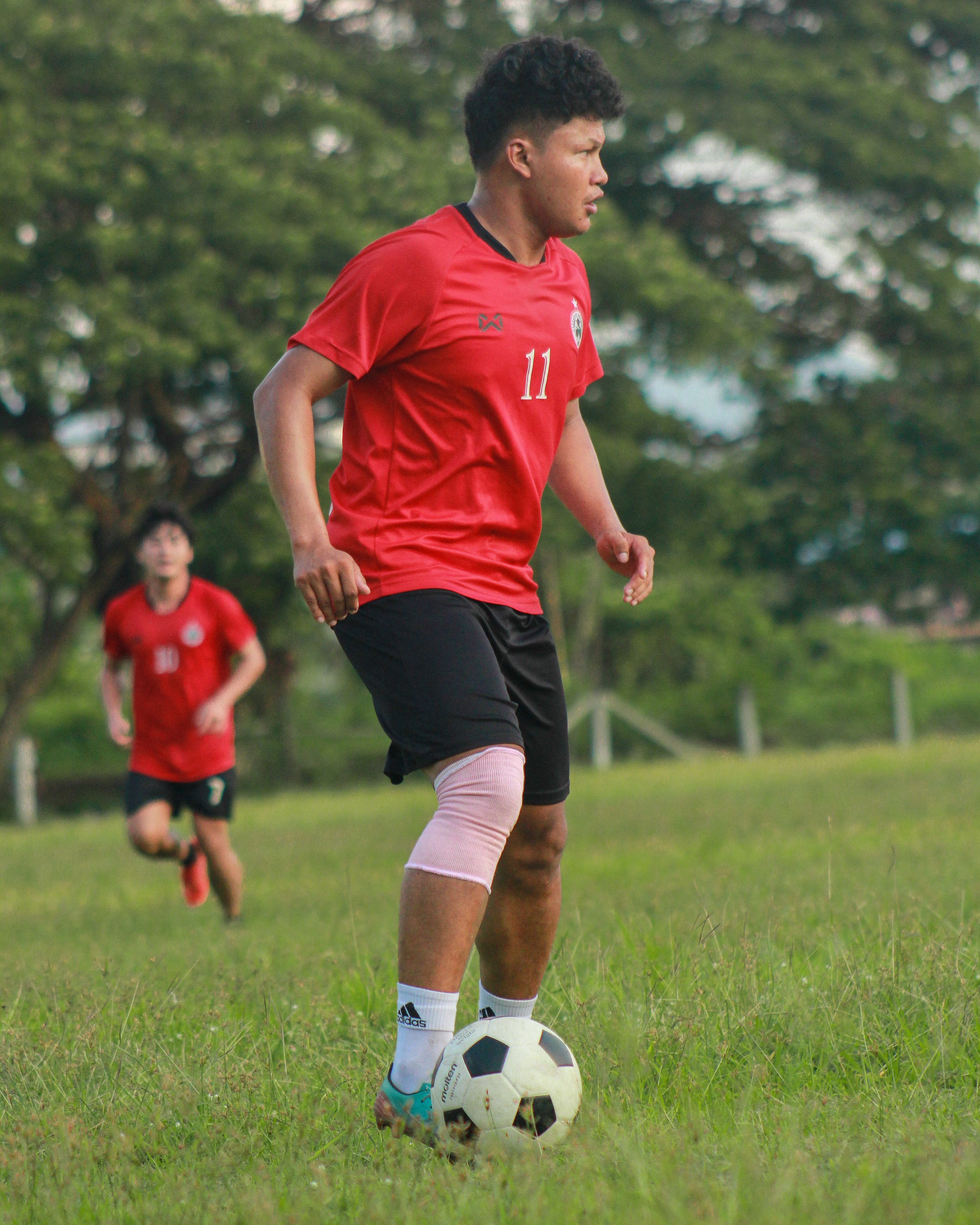 Young Soccer Players in Action on Field
