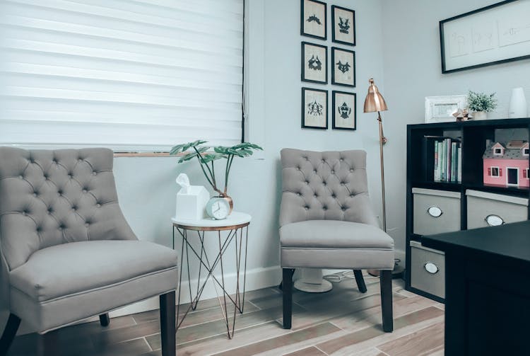 Gray Chairs Near White Round Table In Psychotherapist Office