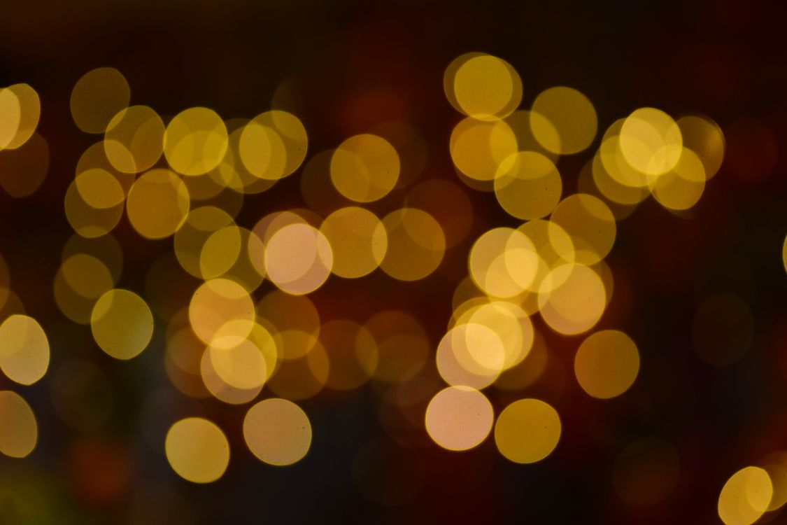 Golden Bokeh Light Circles in Abstract Photography · Free Stock Photo