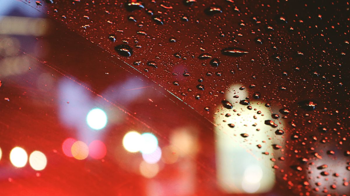 Photo: Madison Inouye / Pexels City lights blurred through a rain-covered car window at night