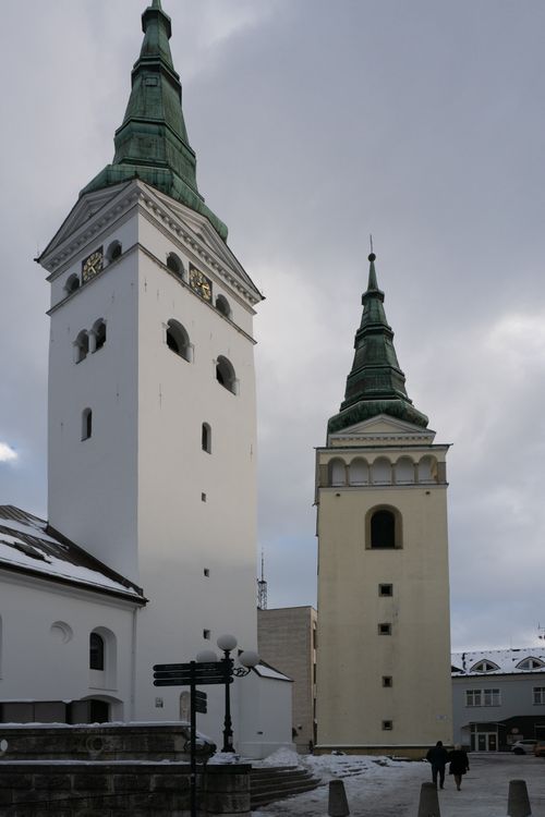 Free A winter scene showcasing historical church towers under an overcast sky. Stock Photo