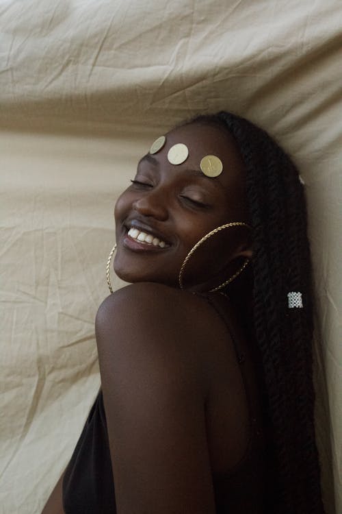 Woman with Hoop Earrings Smiling