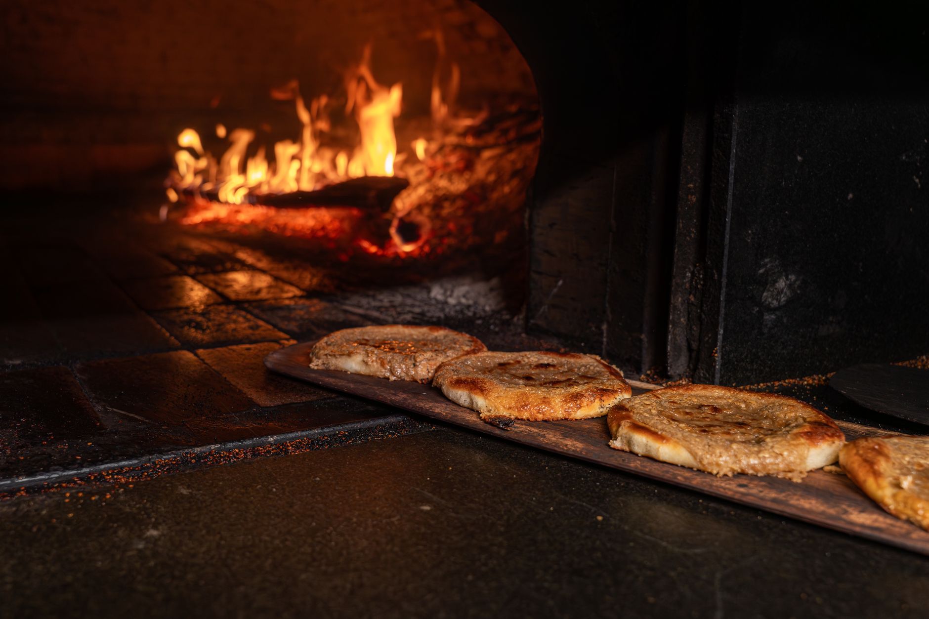 Wood-fired pizzas and pasta at Bella's on the Springfield square
