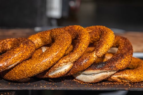 Free Delicious Turkish simit bread rings, fresh and crunchy with sesame seeds, perfect for breakfast. Stock Photo