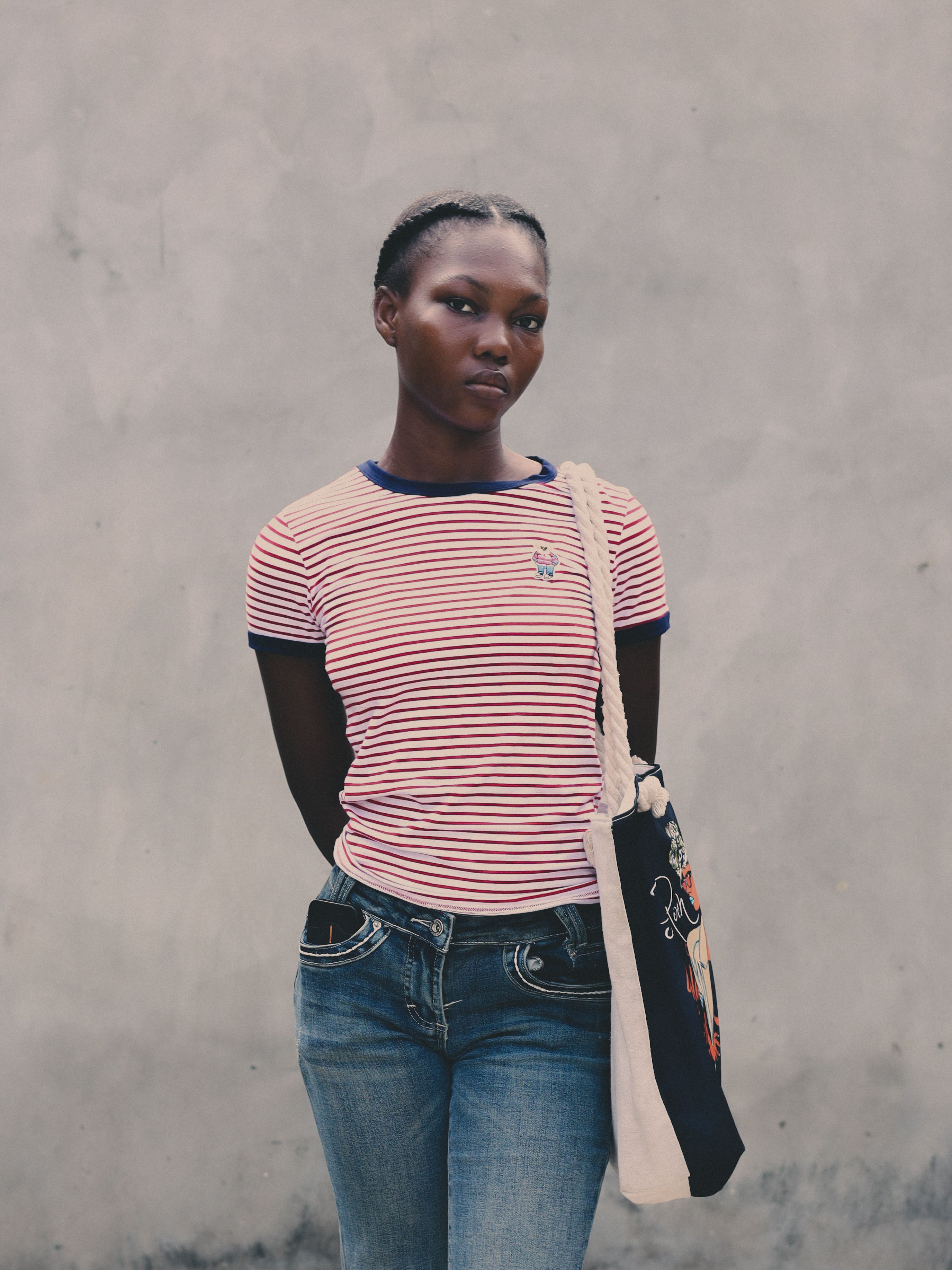Portrait of Young Woman in Striped Shirt · Free Stock Photo