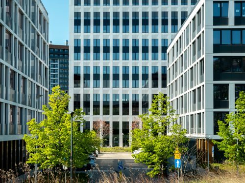 Free Contemporary office buildings in the business district of Wrocław, Poland, showcasing modern design and urban development. Stock Photo
