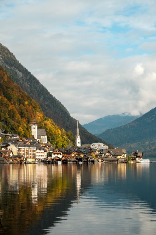 Free Picturesque autumn landscape of Hallstatt village by the lake in Austria. Stock Photo