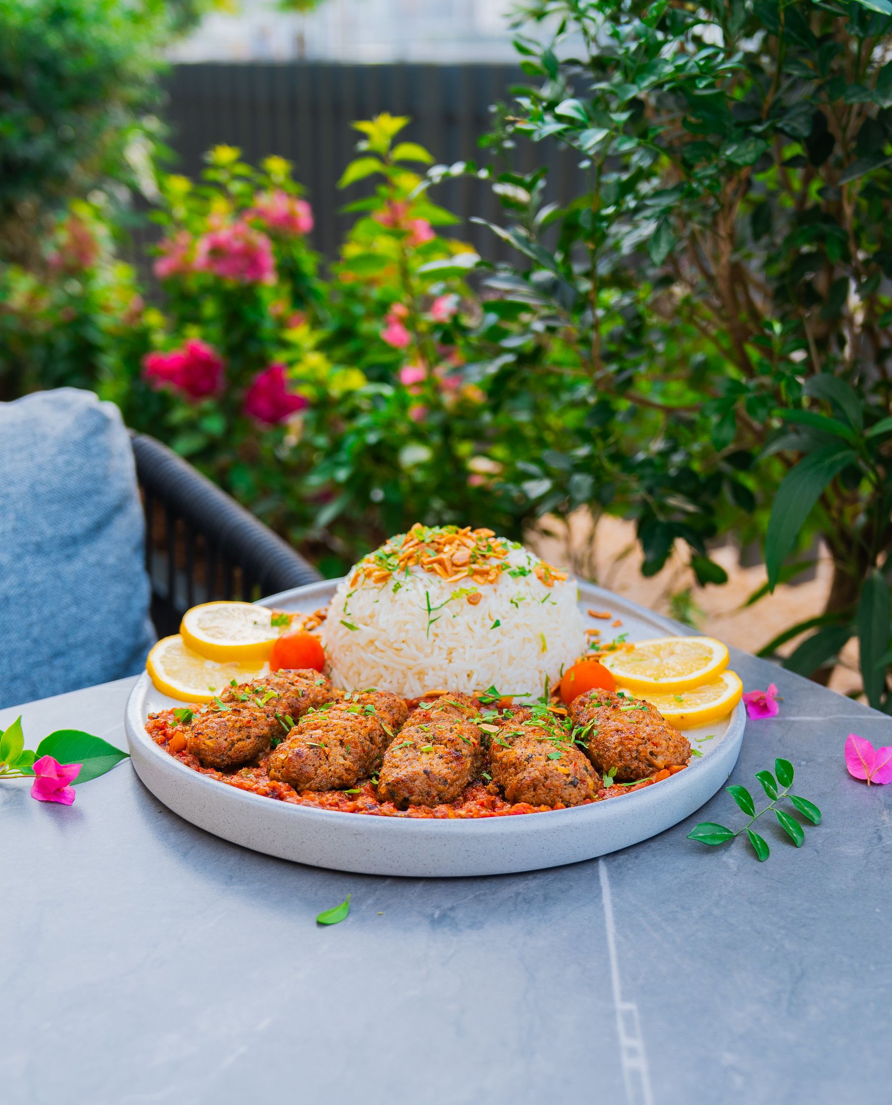 Middle Eastern kebabs and rice presented for a feast
