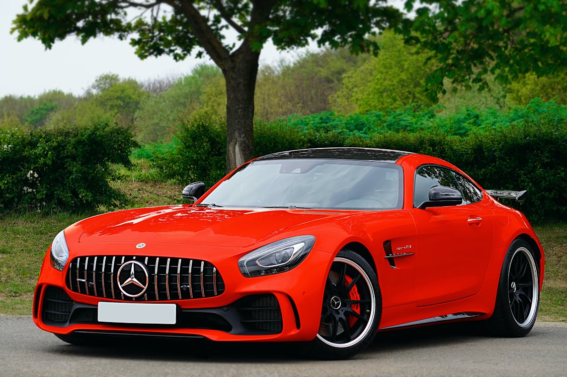 Free Photo of Red Car Parked Stock Photo