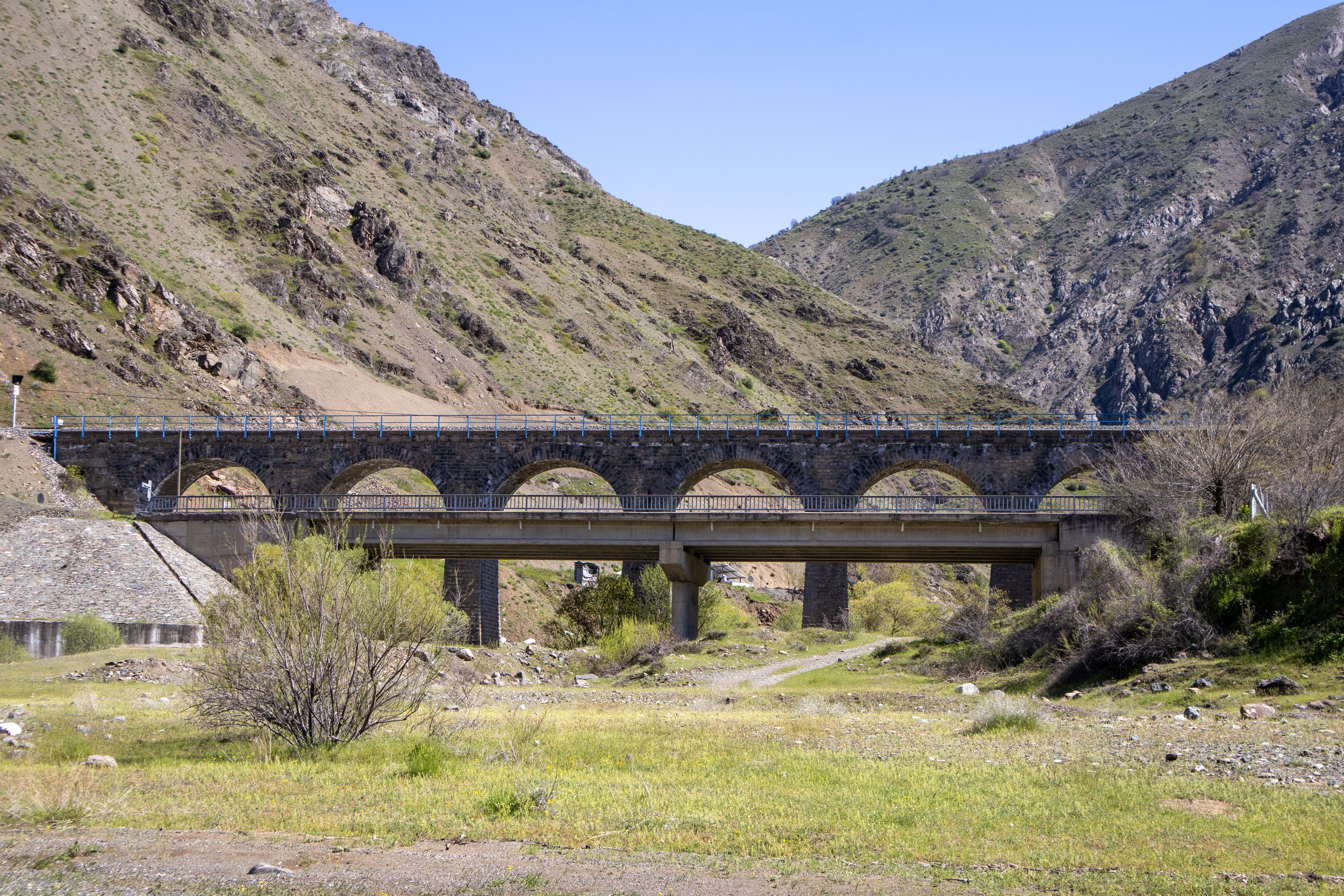 Historic railway bridge in mountain setting