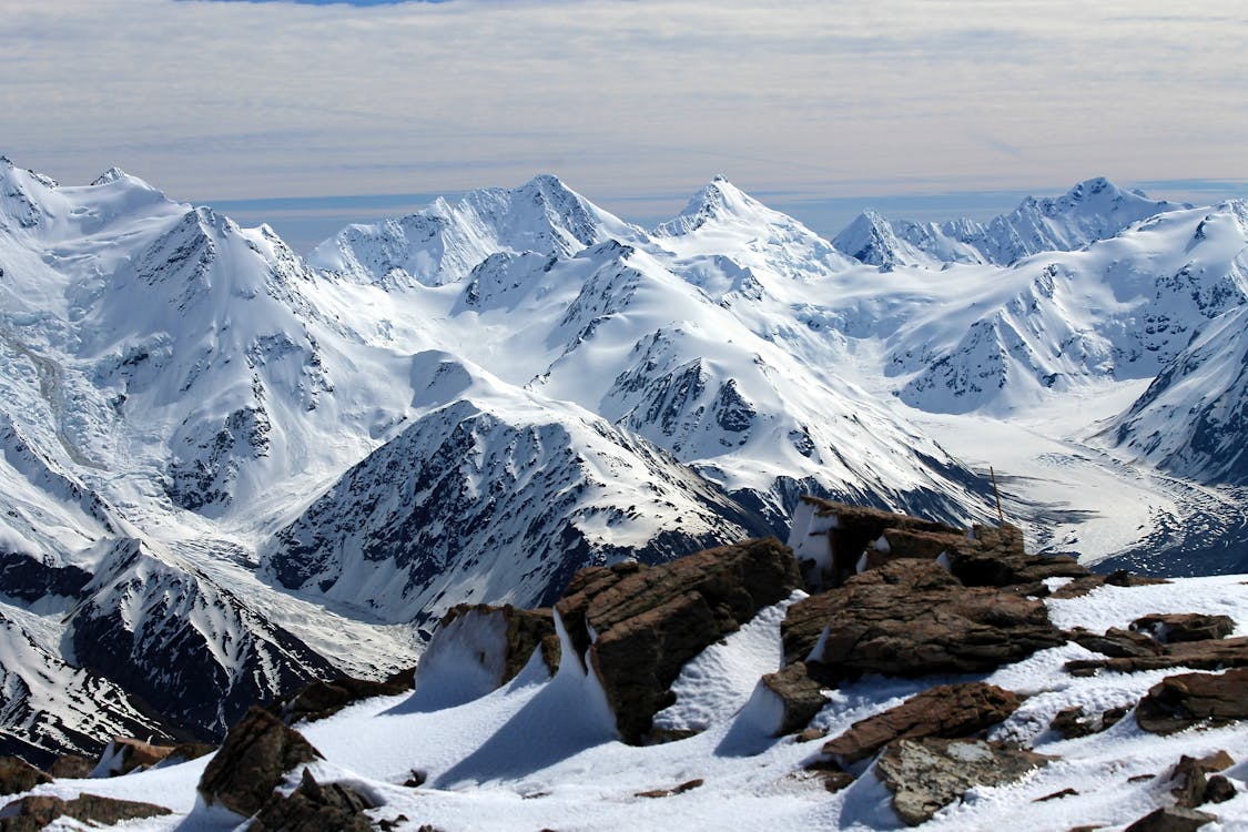 Free Aerial Photography of Mountains Covered With Snow Stock Photo