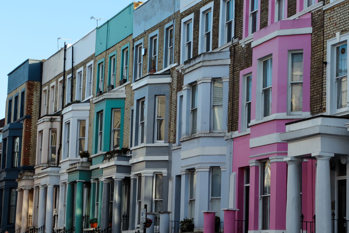 A row of colourful London terraced houses