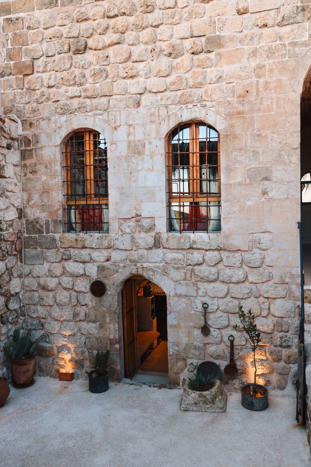 Historic Stone Architecture with Arched Windows · Free Stock Photo