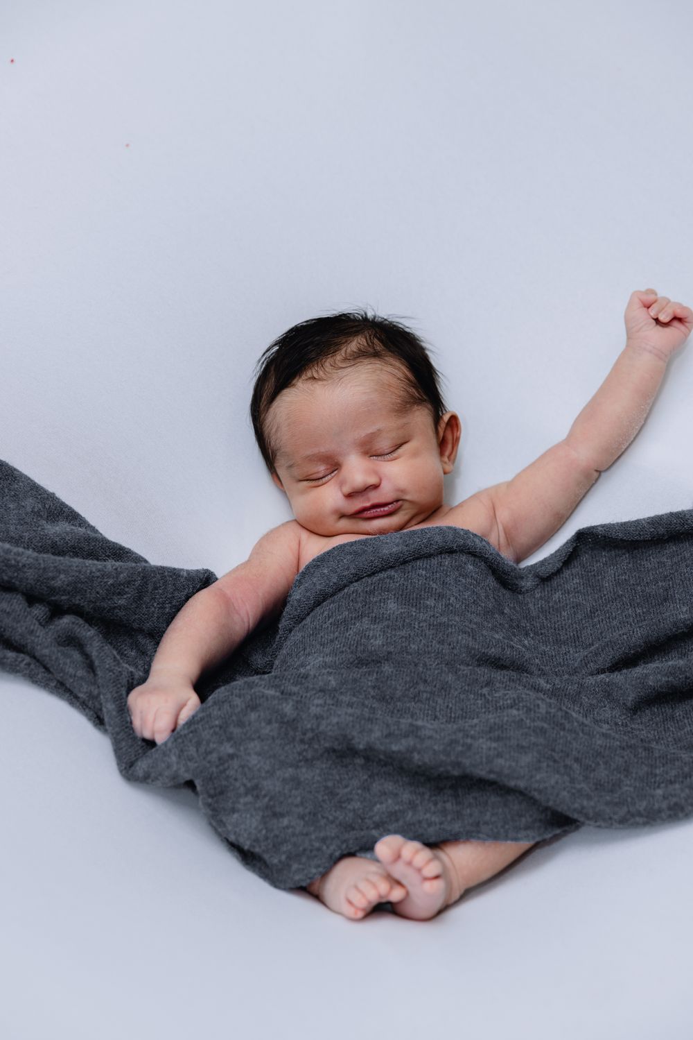 Newborn baby wrapped in a soft blanket