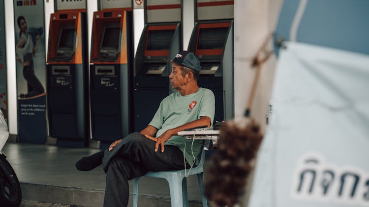 Man Sitting On Chair