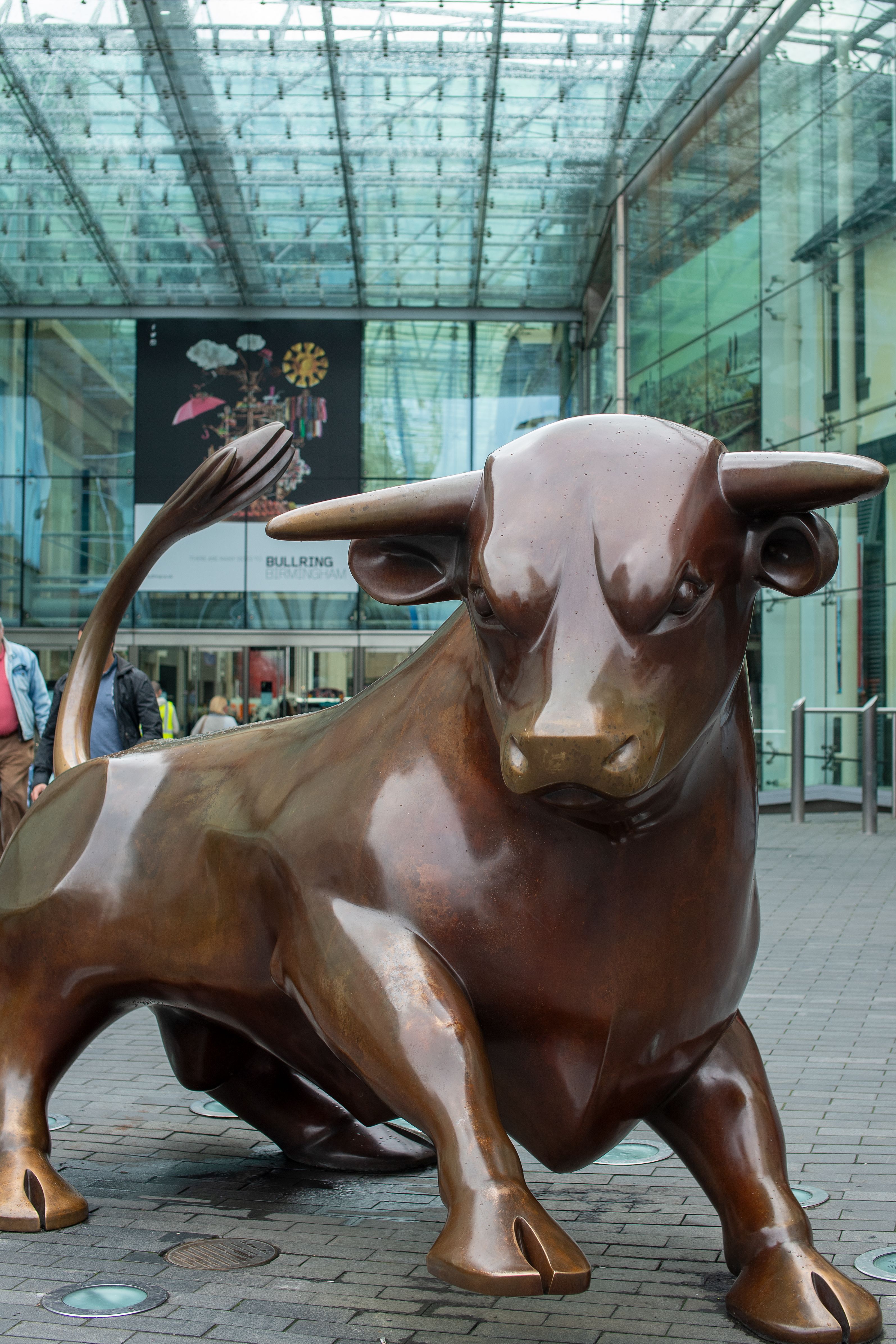 Bronze bull statue at the Bullring shopping centre in Birmingham, UK - a popular city landmark.