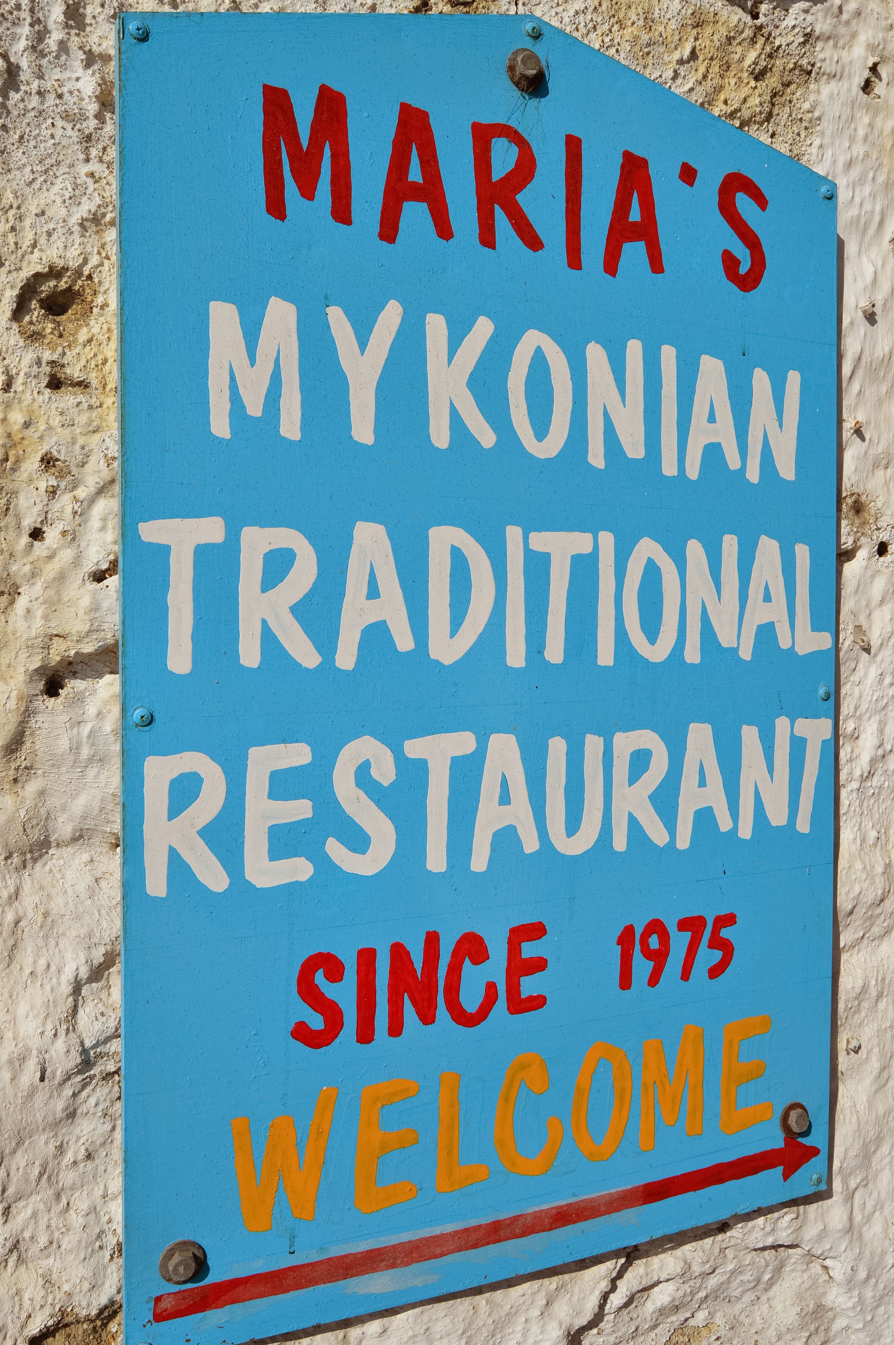 Blue sign for Maria's Mykonian Traditional Restaurant, Mykonos, Greece.