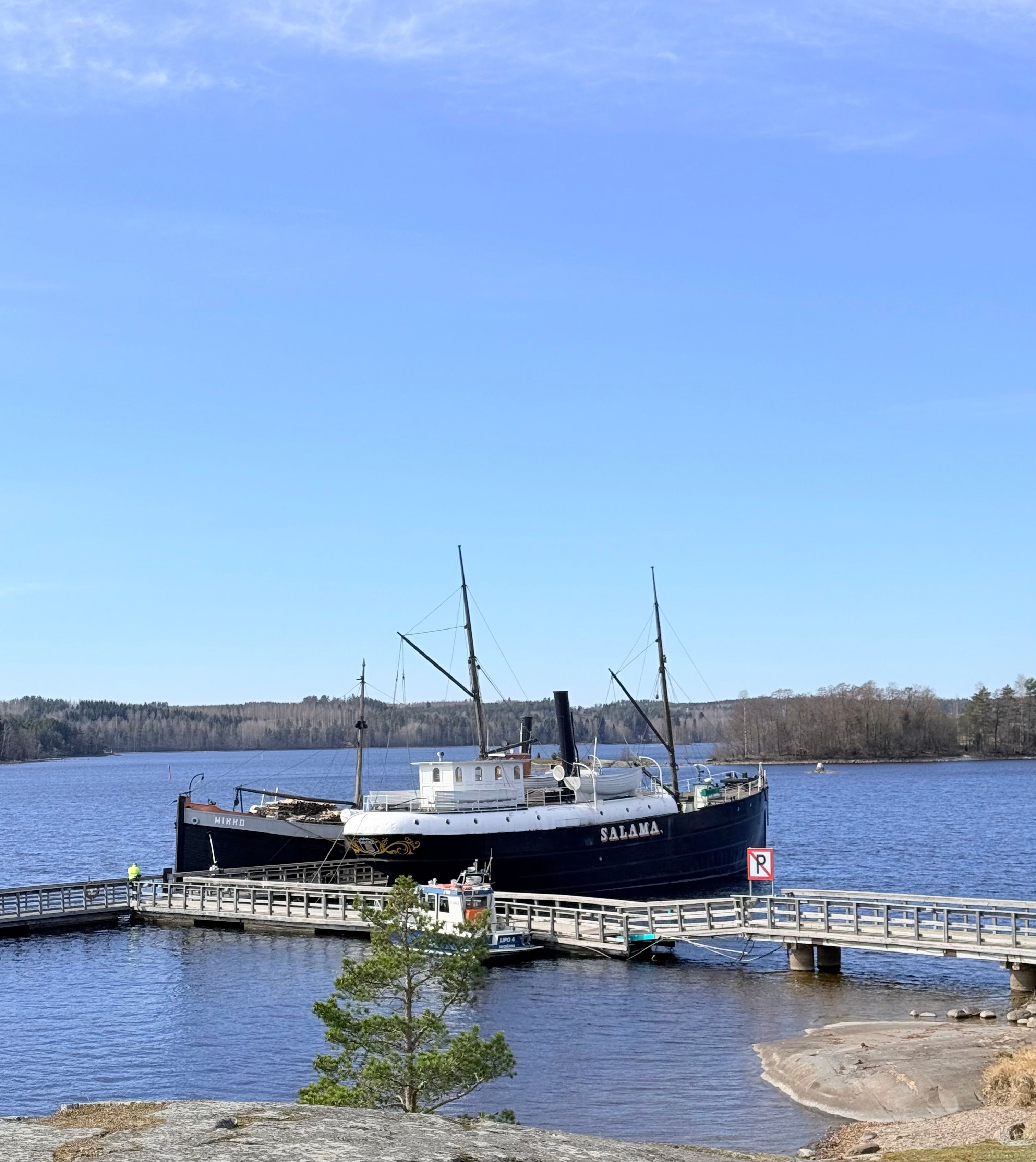 Steamship Salama docked at Saimaa Lake in Savonlinna, Finland on a clear day.