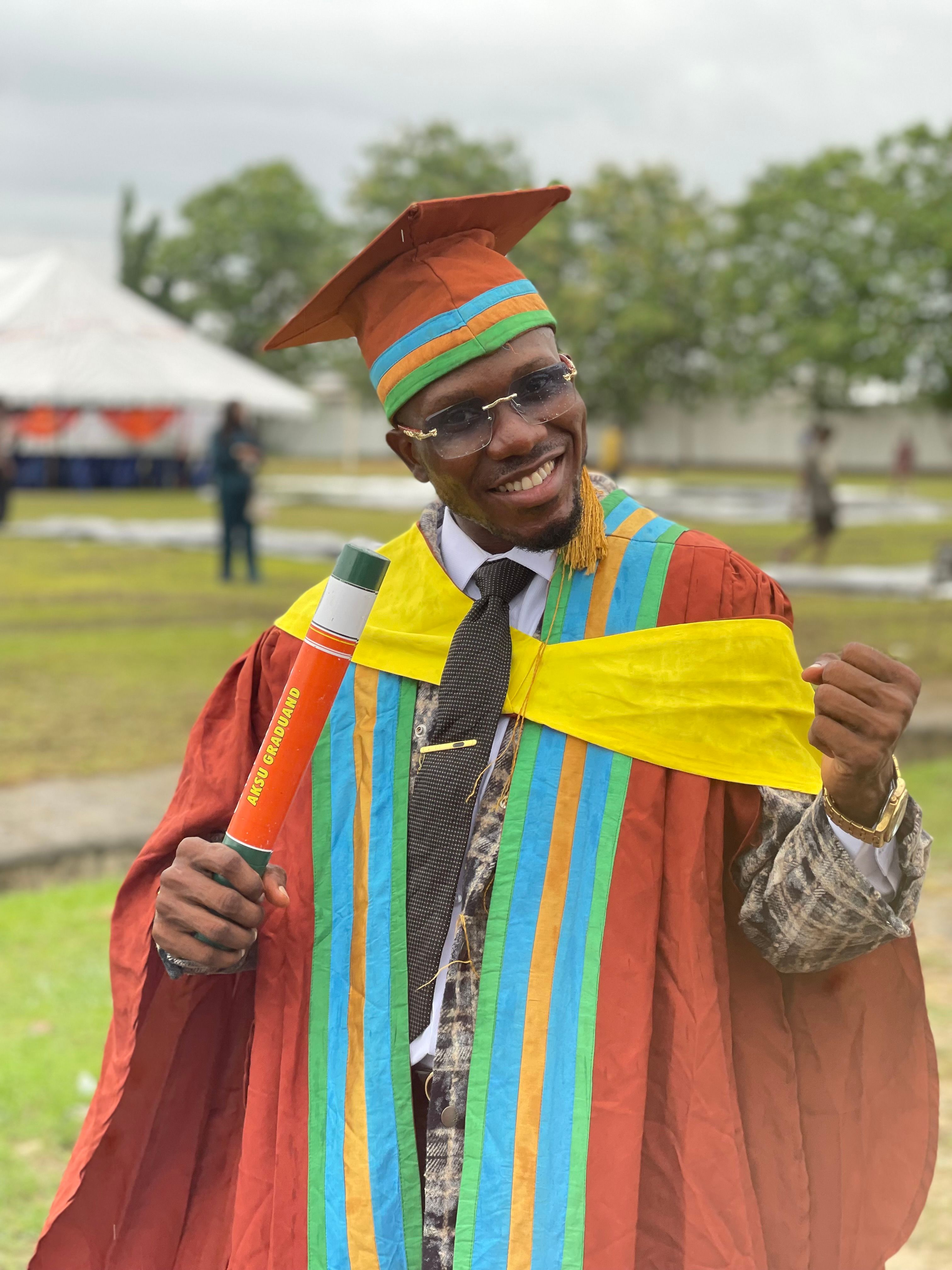 Graduation Ceremony in Colorful Academic Attire · Free Stock Photo