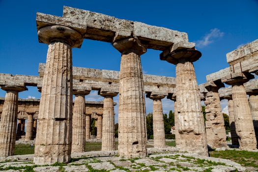 Explore the majestic ancient Greek temple ruins at Paestum, Campania in Italy.