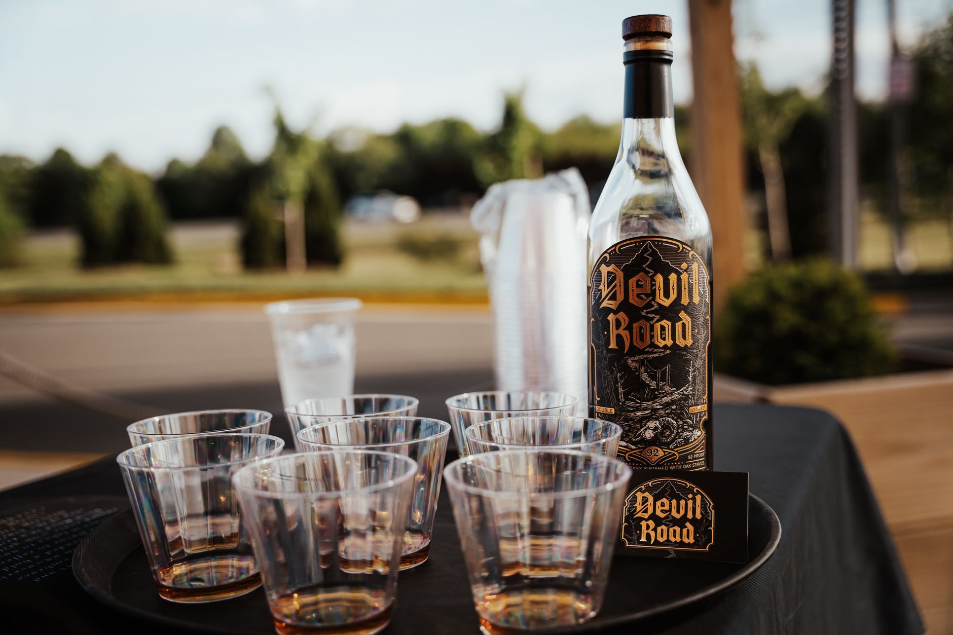 toasted marshmallow added to a glass of bourbon
