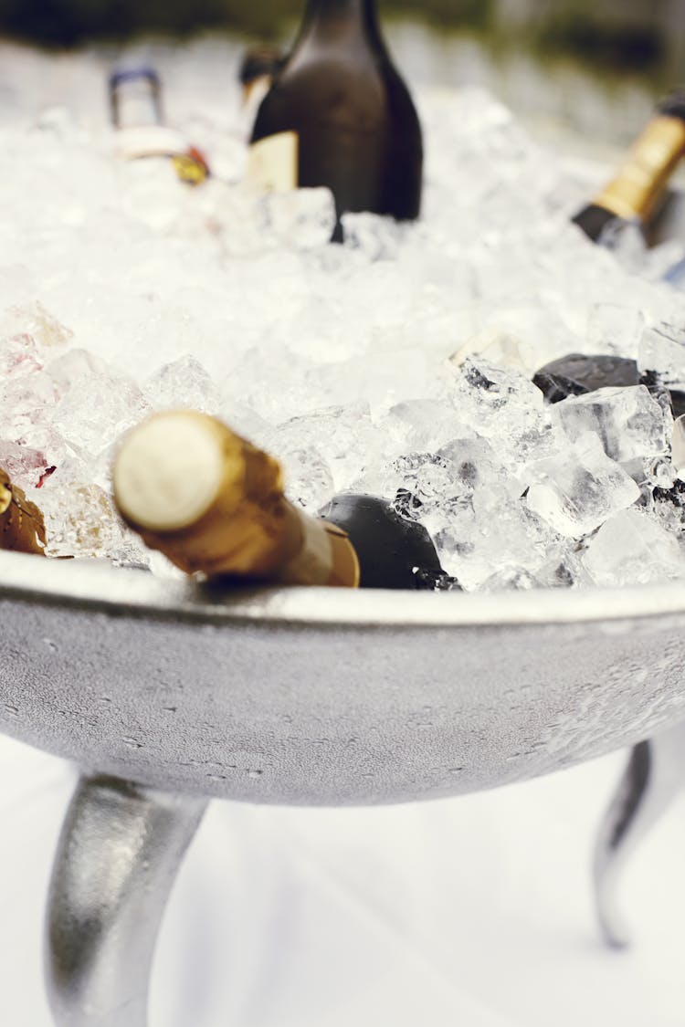 Wine Bottles In Stainless Steel Tray Filled With Ice