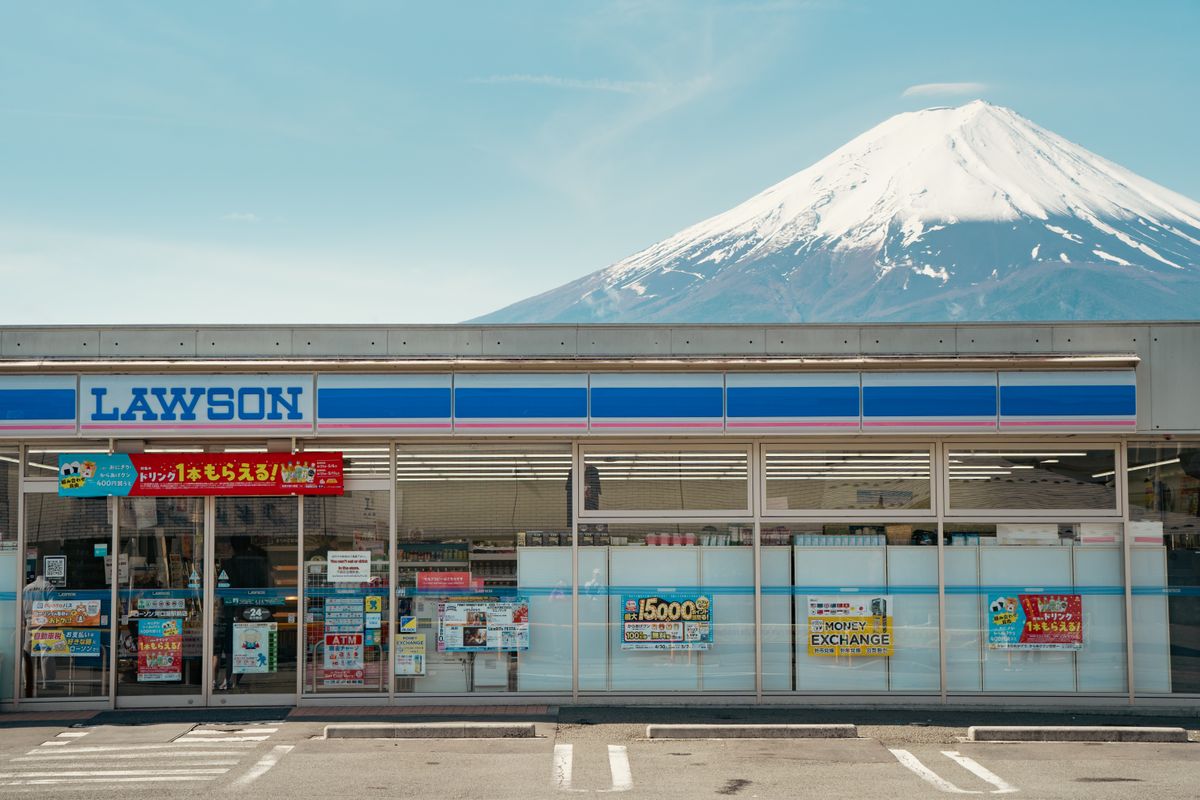 A Lawson convenience store with Mount Fuji in the background