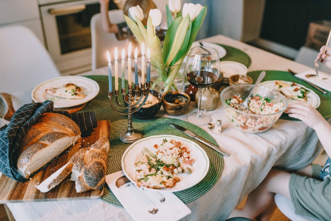 Free Hanukkah Meal on Dinner Table Stock Photo