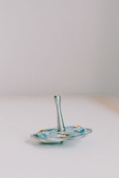 A dreidel in motion with a blur effect, capturing the essence of Hanukkah tradition.