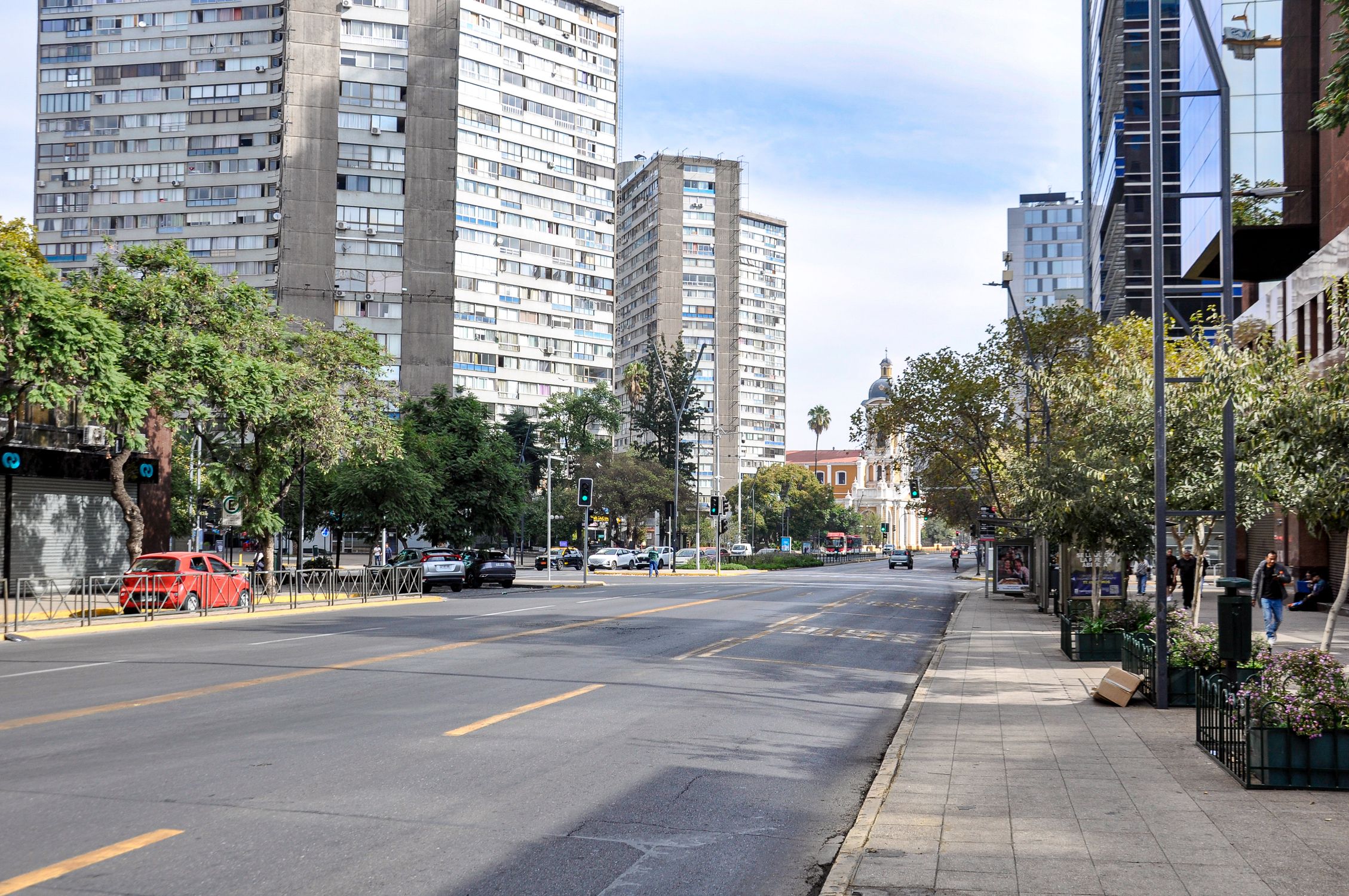 Urban street scene in Santiago, showcasing city life and architecture.