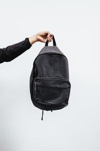 Dark gray backpack against a plain background