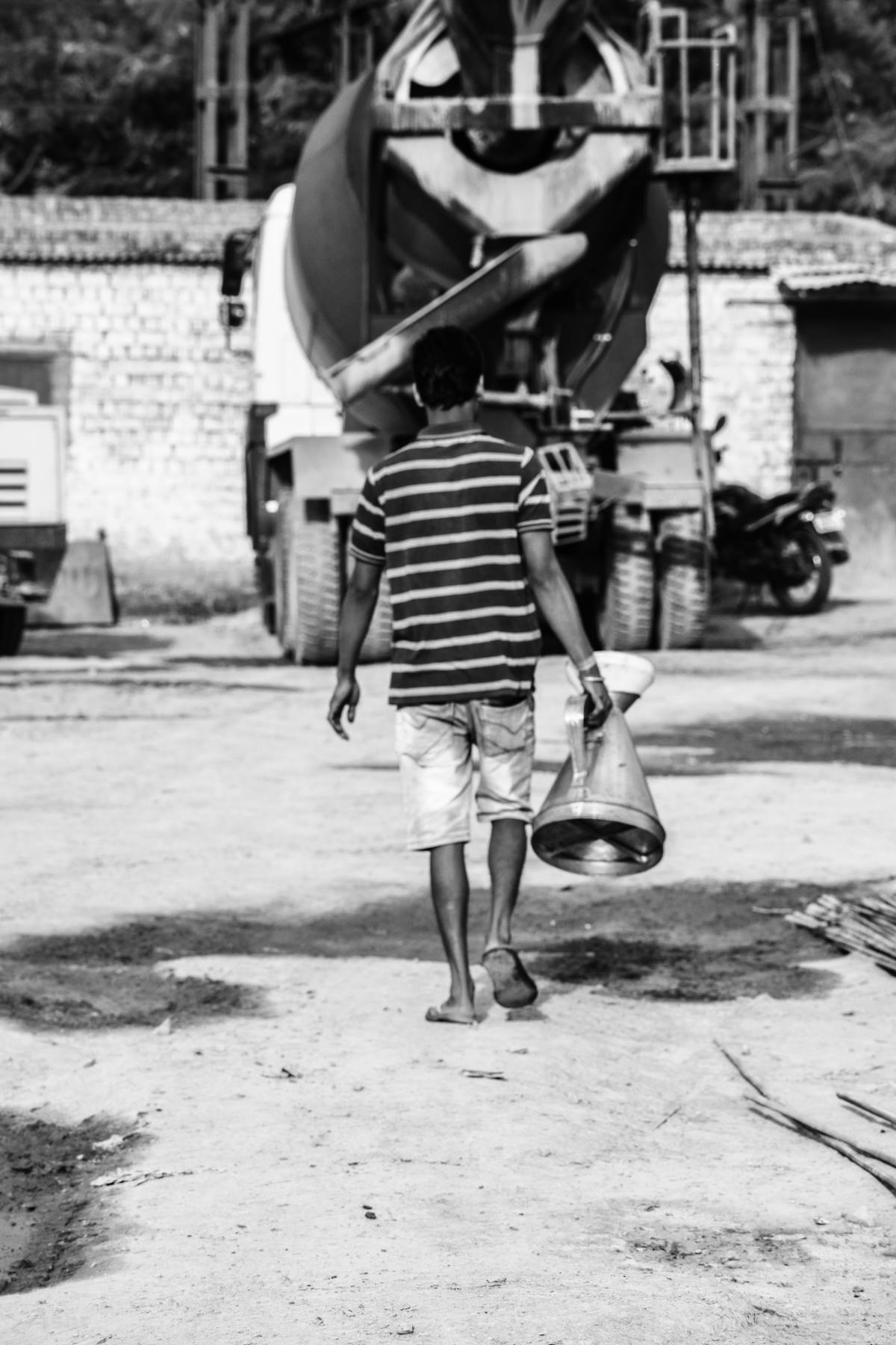 Small bowls of pickles and kimchi arranged with rice and soup