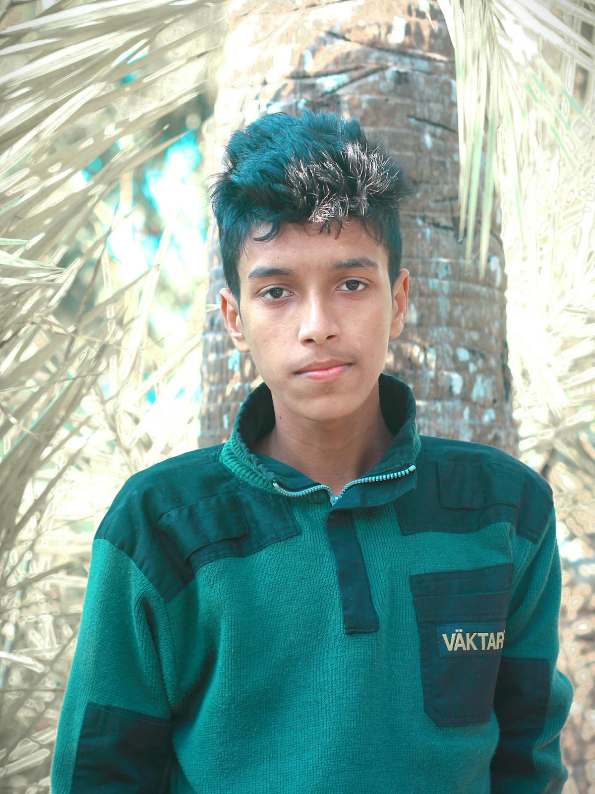 Creamy sauce being whisked in a small bowl on a countertop