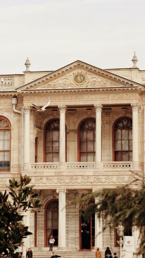 Free Captivating view of the Dolmabahçe Palace's neoclassical façade in Istanbul with intricate detailing. Stock Photo