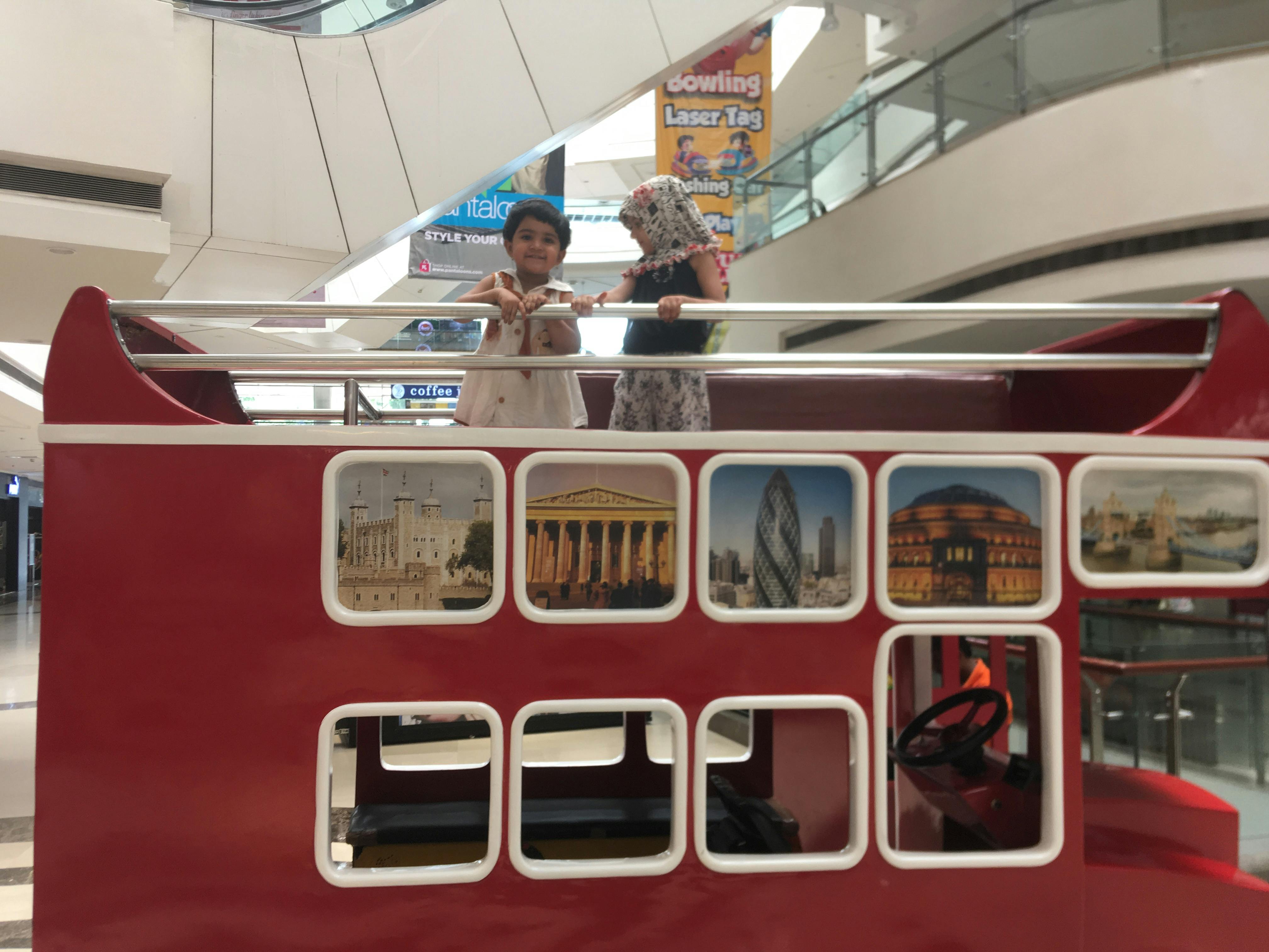 Meal prep containers filled with vegetables, grains, and proteins arranged on a counter