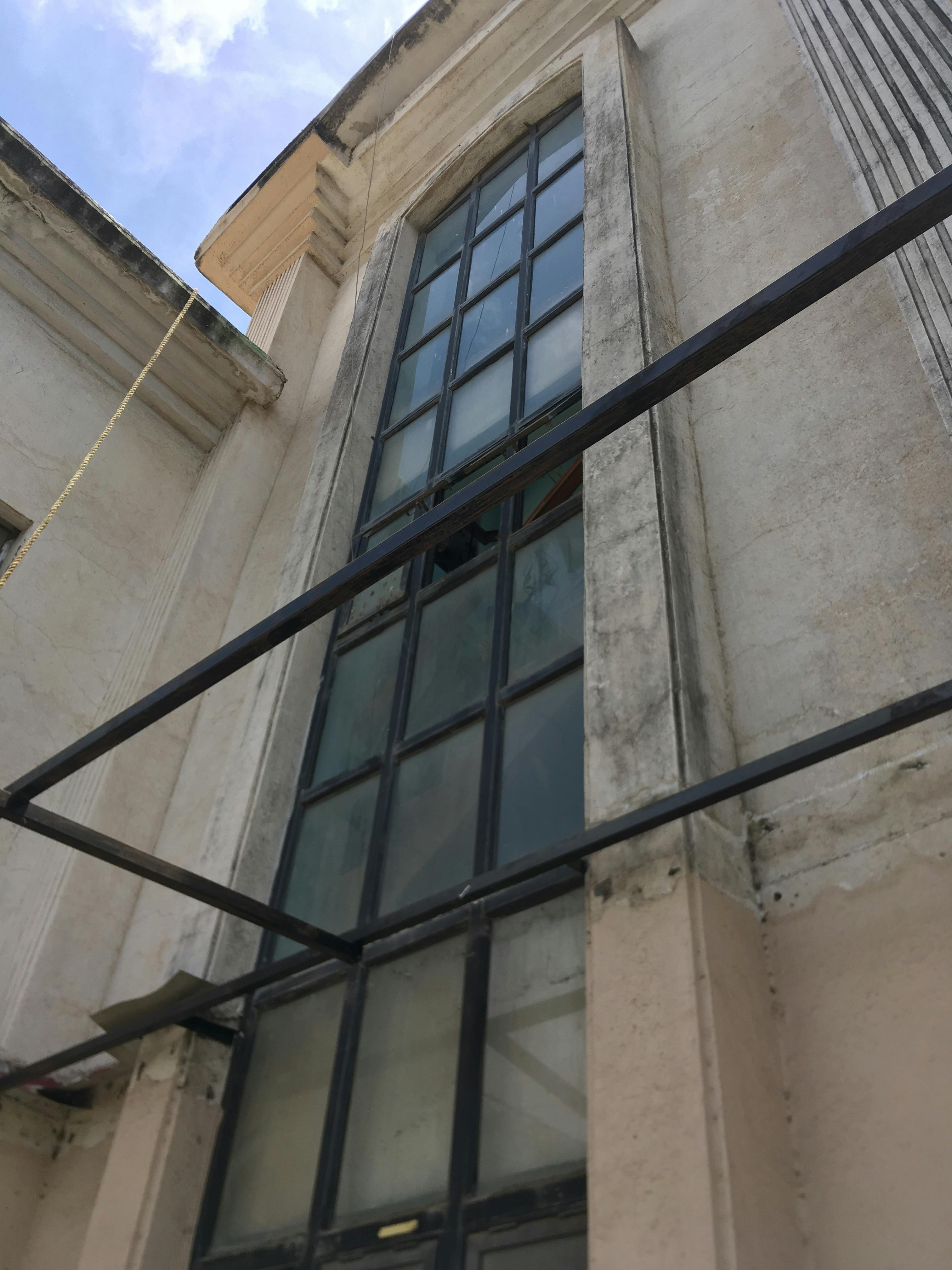 Breakfast spread featuring bowls of yogurt, fruit, and granola
