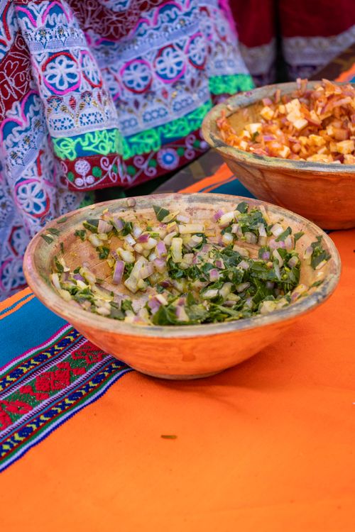 Free Colorful display of traditional Peruvian food bowls at a cultural event in Arequipa. Stock Photo