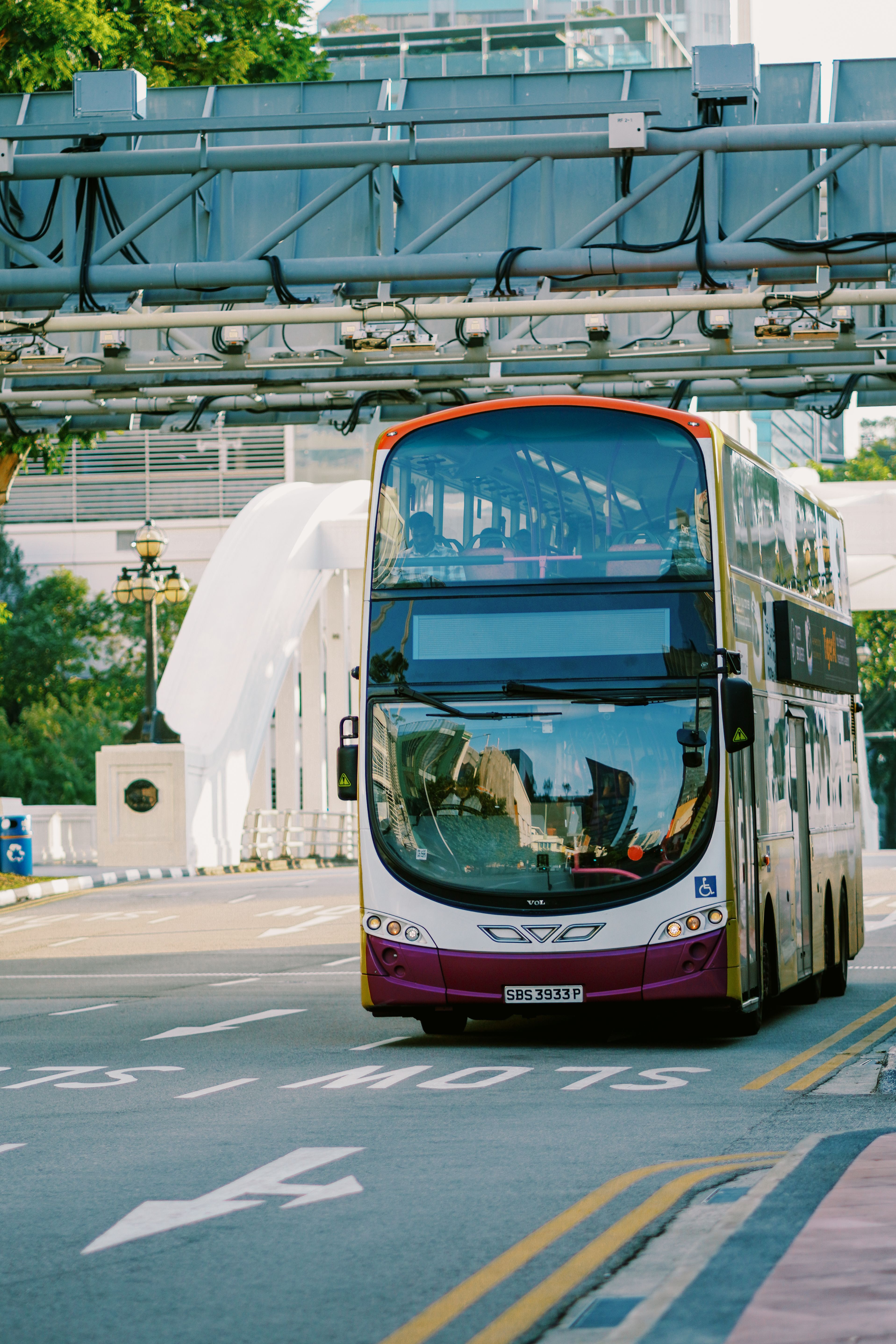 Double-Decker Bus on Urban Street in Daylight · Free Stock Photo