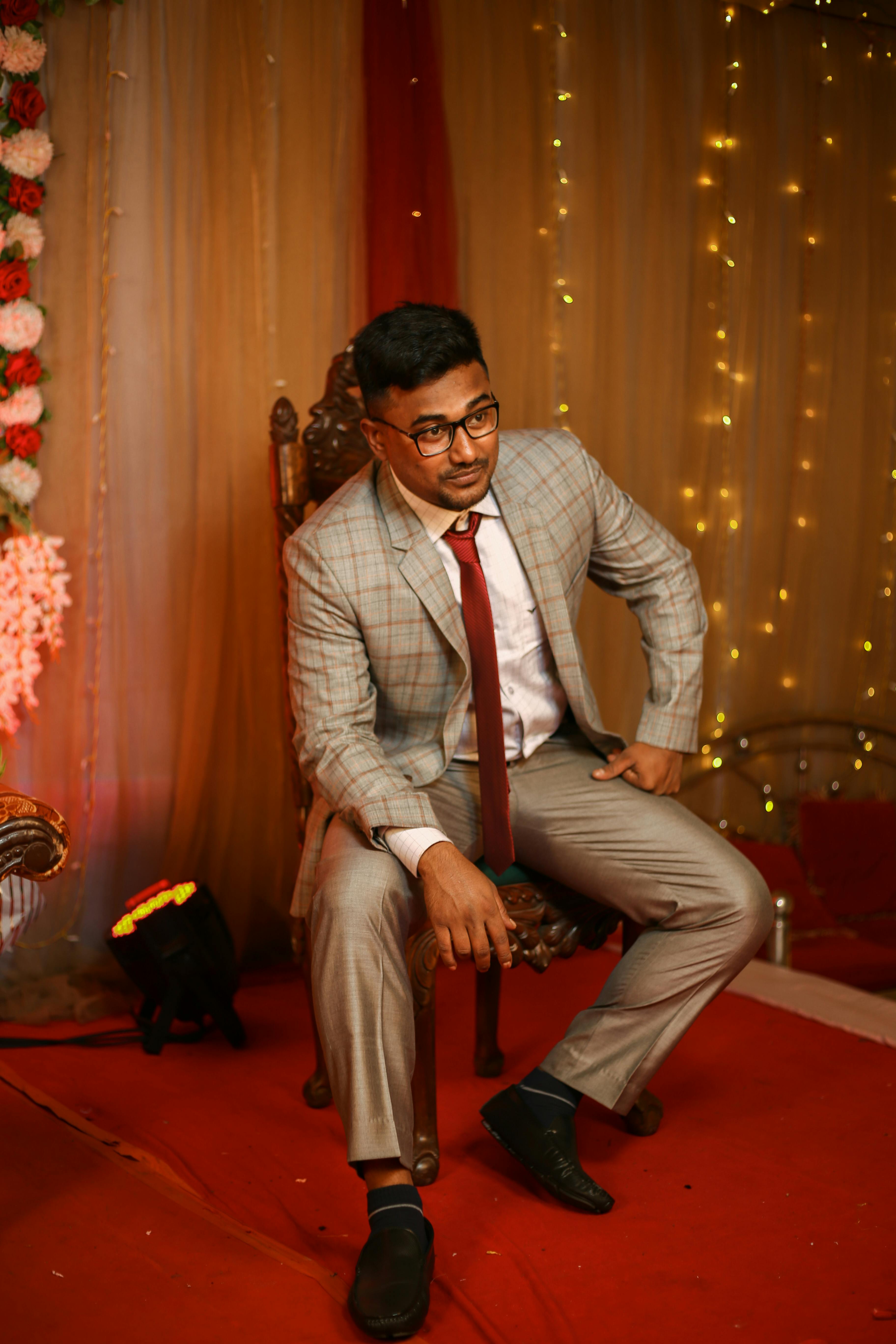 Stylish Indian man on chair