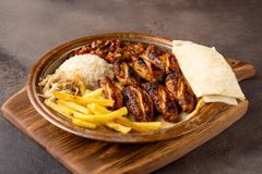 Grilled chicken plate, photo by Kemal Can on Pexels
