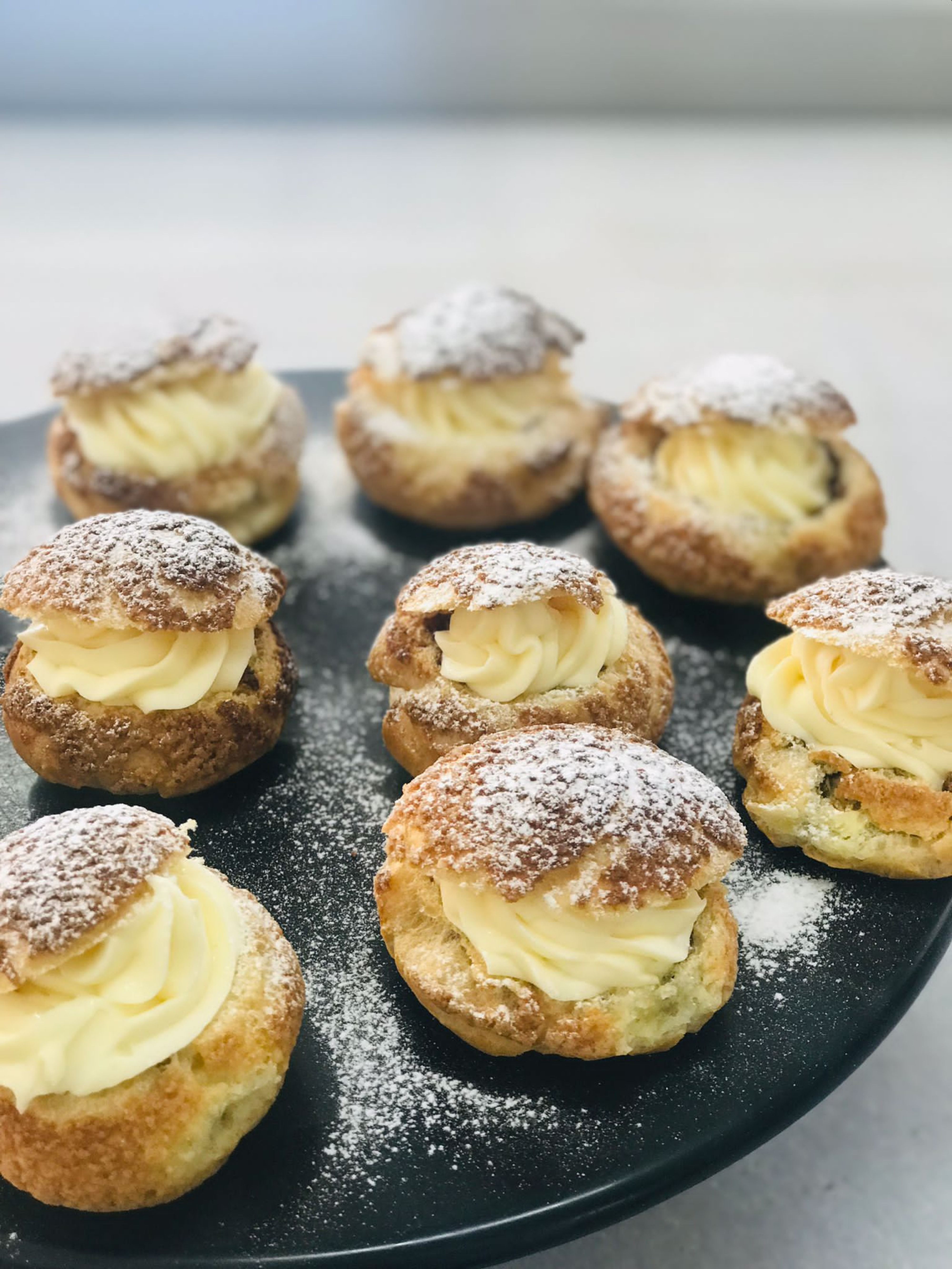 Choux Pastry with Pistachio Cream Topping Served on Tray · Free Stock Photo