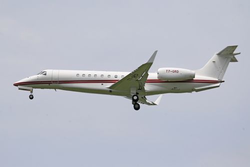 Free Private jet flying in clear sky, offering a sense of luxury and travel freedom. Stock Photo