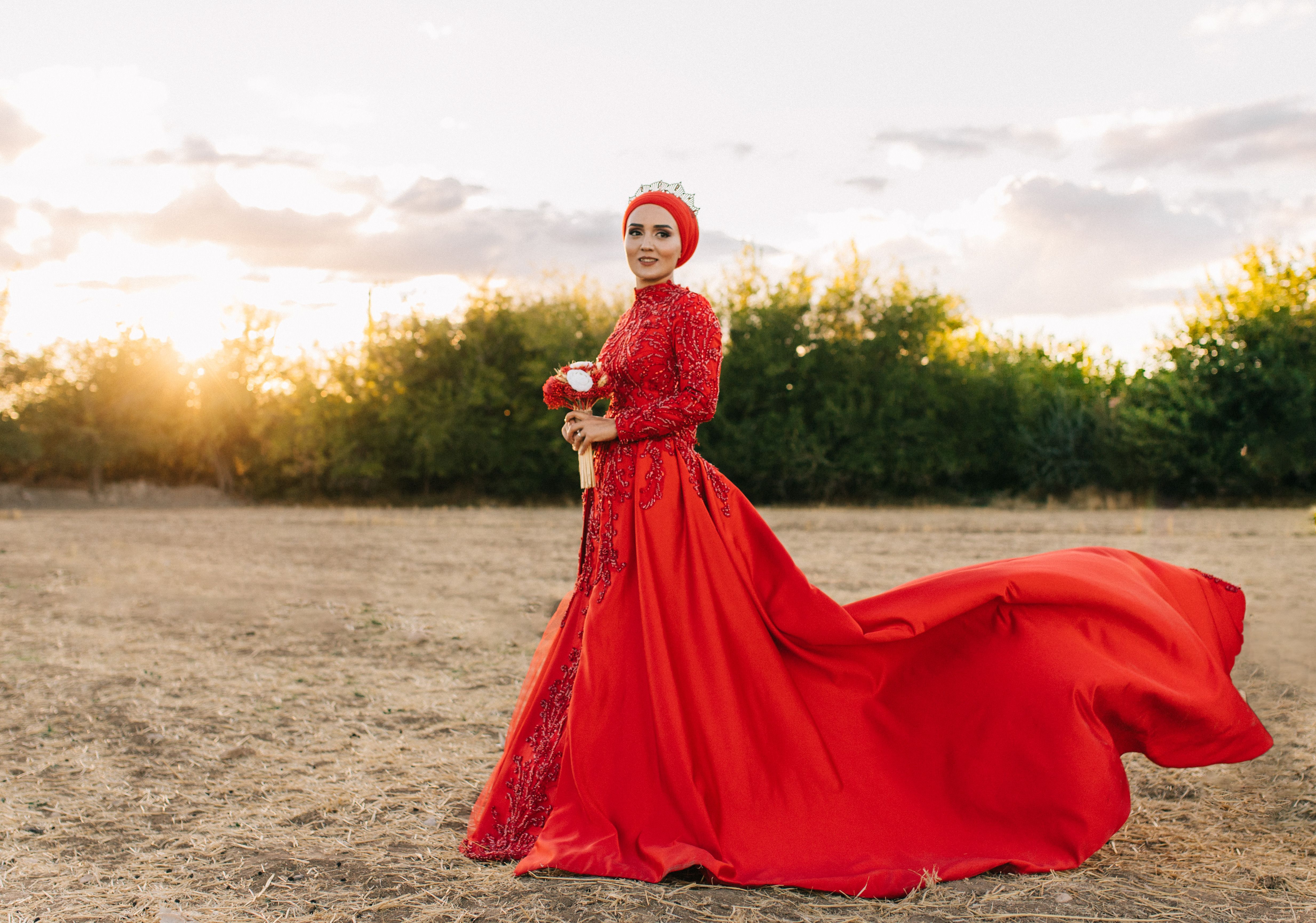 Elegant Woman in Red Dress at Sunset Outdoors · Free Stock Photo