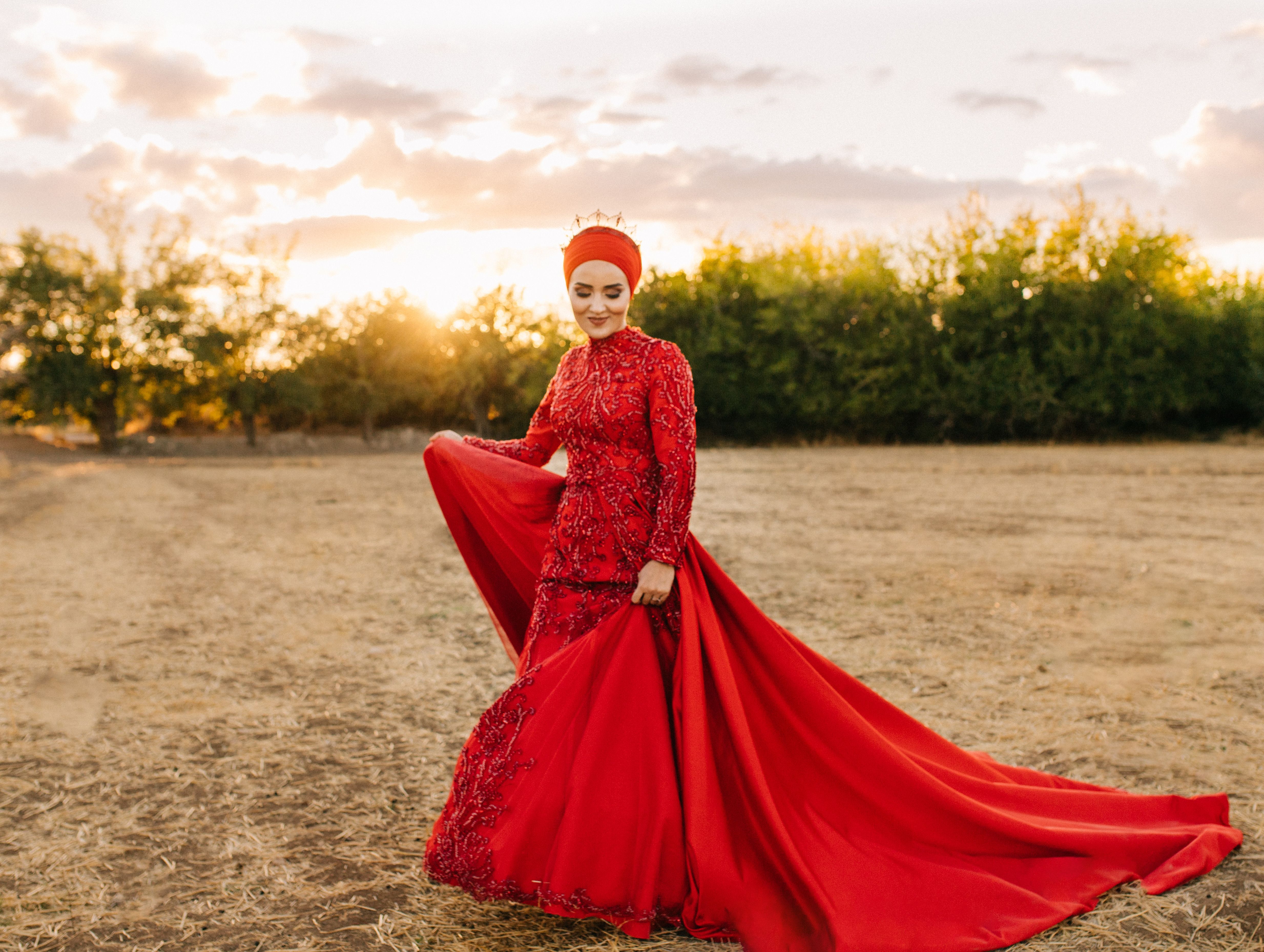 Elegant Woman in Red Dress at Sunset Outdoors · Free Stock Photo
